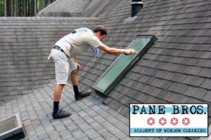 washing skylight window on roof in Chicago